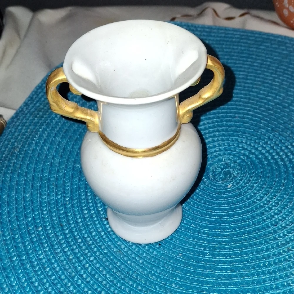 Elegant White Vase with Gold Accents